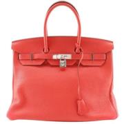 Pre-owned Leather handbags Hermès Vintage , Red , Dames