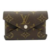 Pre-owned Canvas wallets Louis Vuitton Vintage , Brown , Dames