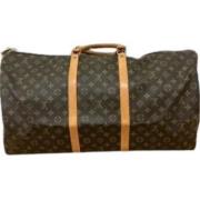 Pre-owned Canvas travel-bags Louis Vuitton Vintage , Brown , Dames