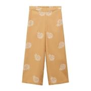 Mango Kids broek met all over print en borduursels mosterdgeel/wit Mei...