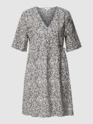 Mini-jurk in wikkellook