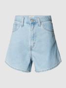 Korte mom fit jeans met knoop- en ritssluiting