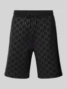 Regular fit sweatshorts met all-over labelprint