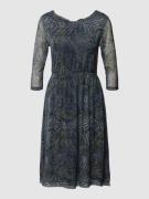 Mini-jurk met semi-transparante garnering