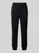 Tapered fit sweatpants met labelbadge