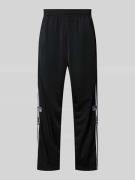 Flared sweatpants met labelstitchings, model 'ADIBREAK''