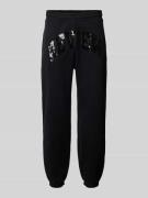 Regular fit sweatpants met pailletten