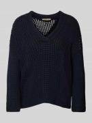 Gebreide pullover met ajourpatroon