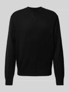 Gebreide pullover met ribboorden