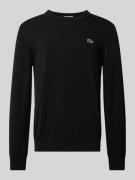 Gebreide pullover met logopatch