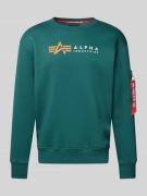 Sweatshirt met labelprint en ritszak