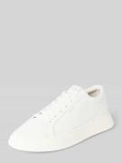 Sneakers met labeldetails