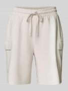 Relaxed fit sweatshorts met cargozakken