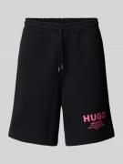 Baggy fit sweatshorts met labelprint, model 'Nomario'