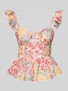 Blouseshirt met vetersluiting aan de achterkant en peplum