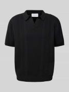 Oversized poloshirt met V-hals