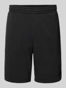 Relaxed fit sweatshorts met labelstitching