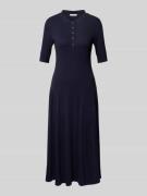 Polojurk met drukknoopsluiting