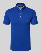 Slim fit poloshirt van een mix van katoen en elastaan