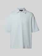 Oversized poloshirt met labelstitching