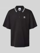Loose fit poloshirt met labelstitching