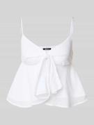 Blousetop met spaghettibandjes en knoopdetail