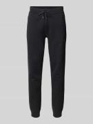 Joggingbroek met elastische band en tunnelkoord