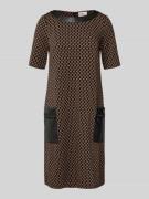 Knielange jurk met ritszakken