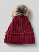 Gebreide muts met wol en pompon