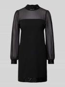 Semi-transparant mini-jurk met pailletten