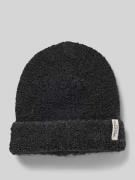 Muts van een mix met wol en alpaca