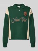 Gebreide pullover met polokraag en labelpatch