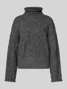 Gebreide pullover met ajourpatroon