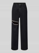 Jeans met cut-outs en siersteentjes