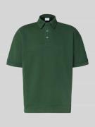 Oversized poloshirt met polokraag en labeldetail