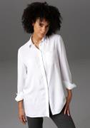 NU 25% KORTING: Aniston CASUAL Lange blouse met "aniston"-galons achte...