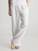 NU 20% KORTING: Calvin Klein Pyjamabroek SLEEP PANT met merklabel op d...