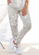 NU 20% KORTING: Lascana Loungebroek met bloemen alloverprint, loungepa...