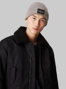 NU 20% KORTING: Calvin Klein Beanie MONO LOGO PATCH BEANIE WARM